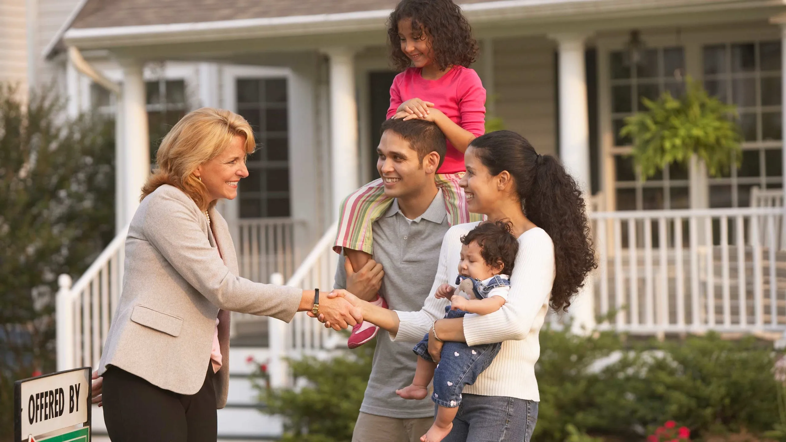 Realtor helping buyers evaluate a home
